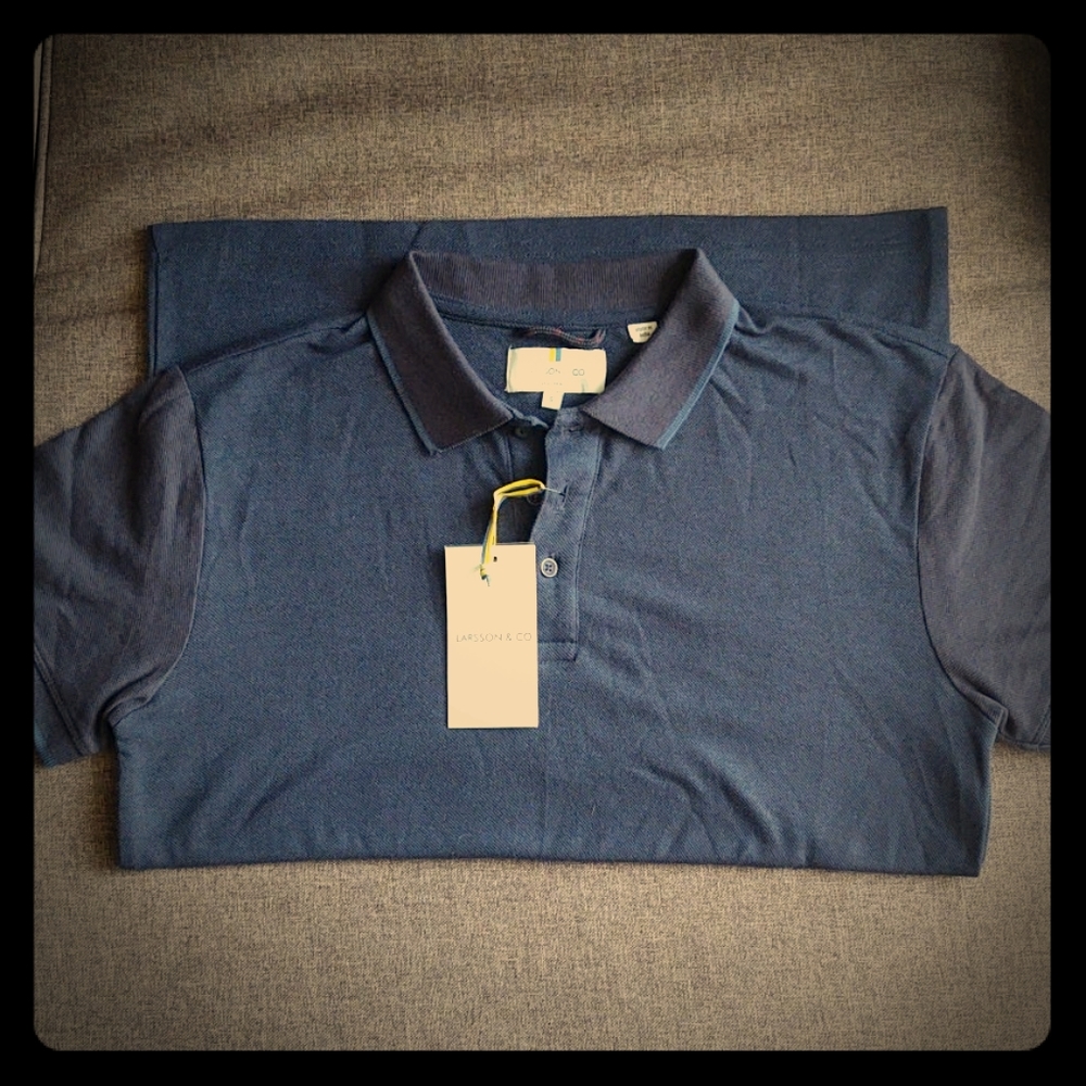 Larsson & Co Man's Navy blue polo shirt.